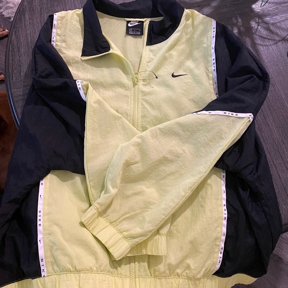 Nike jacket yellow.